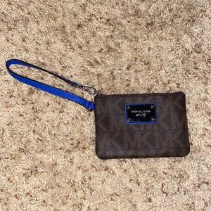 Brown and blue Michael Kors wristlet